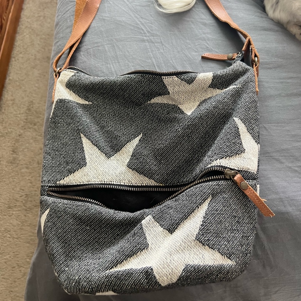 Adorable FatFace UK crossbody bag. Leather strap. Blue with white stars.
